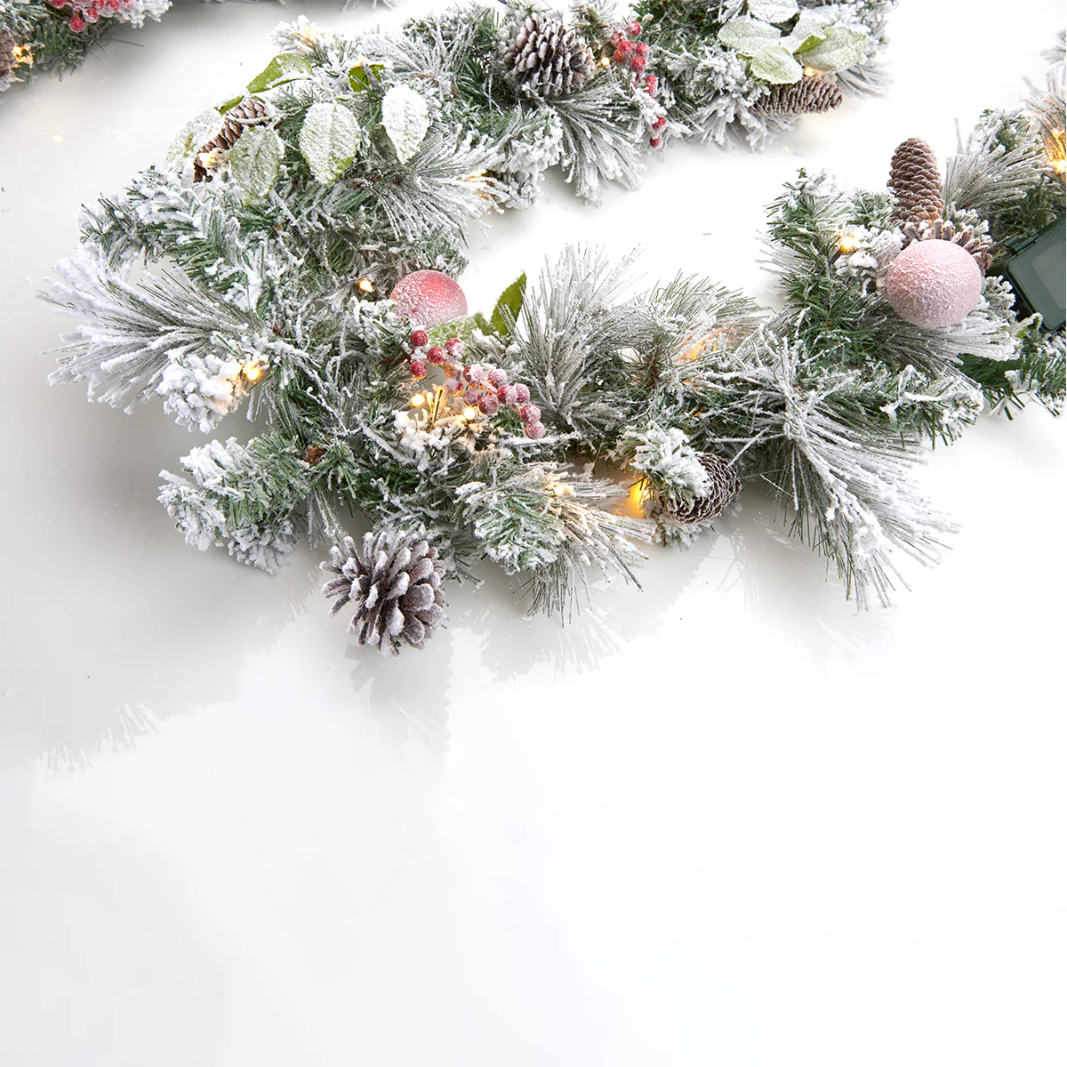 White Flocked 9-Ft. Cordless Pre-Lit Indoor/Outdoor Garland - Image 2
